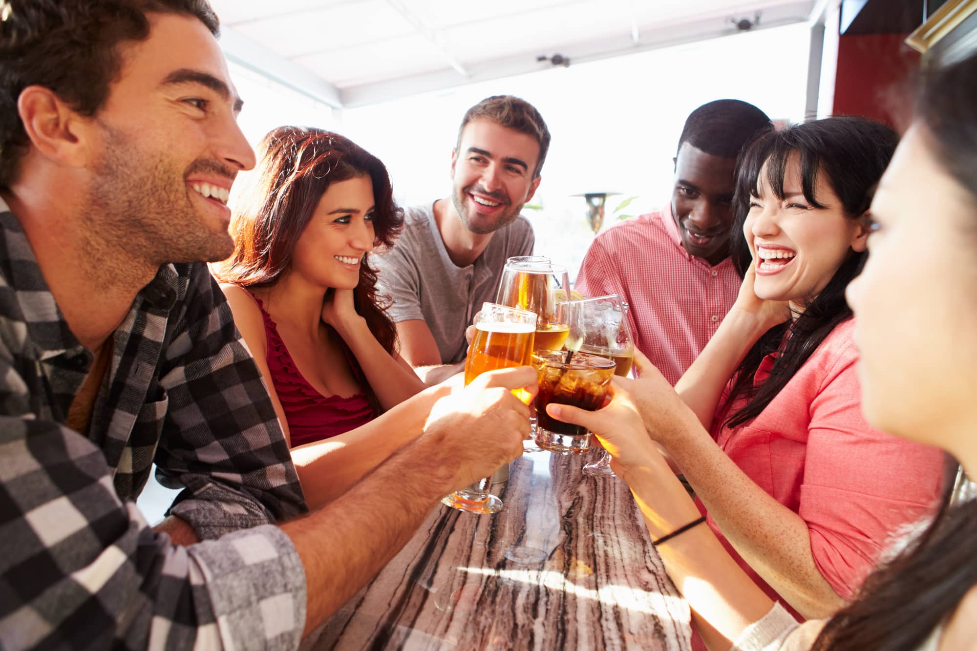 Group of friends at a rooftop bar in Austin, TX.